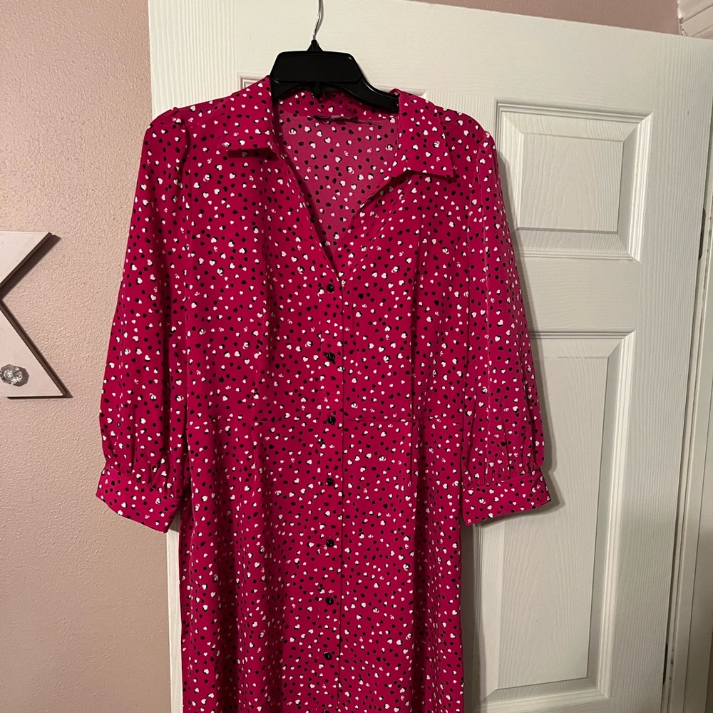 Brand new Karl Lagerfeld shirt dress.  Women’s size 12. No tags but never worn.